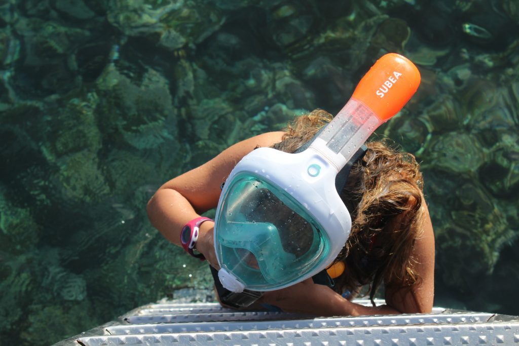 Person wearing a full face mask - I like the idea of the central tube but overall not what i want to wear snorkeling